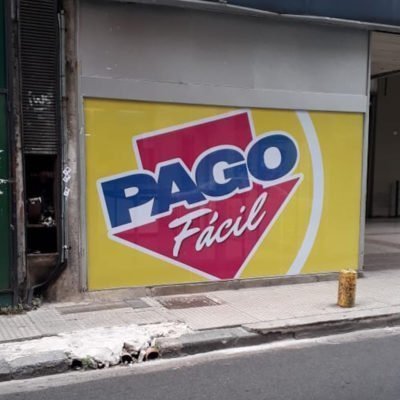 Ploteo de vidriera en microperforado Pago Facil